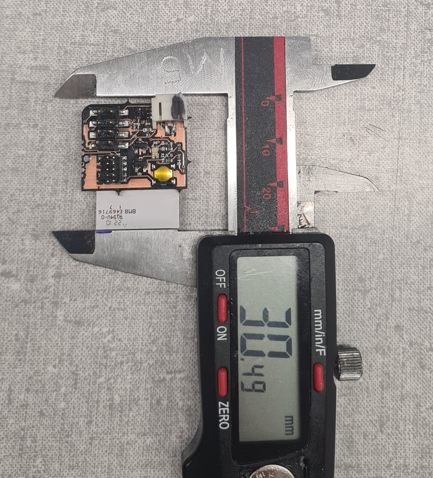 BareTag tag PCB measured with digital calipers